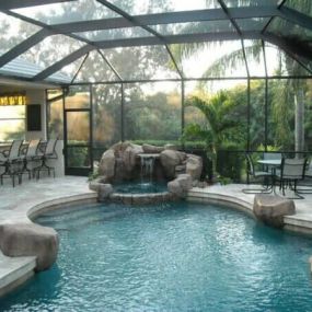 Outdoor Living at its finest, freeform pool and waterfall