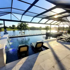 Pool with Baja shelf overlooking lake