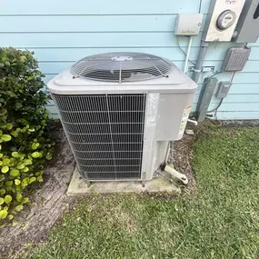 Outdoor A/C compressor unit in Lake Worth, FL, serviced by local HVAC professionals. Ideal for homeowners seeking expert A/C repair and maintenance services near Lake Worth to keep their systems running efficiently.