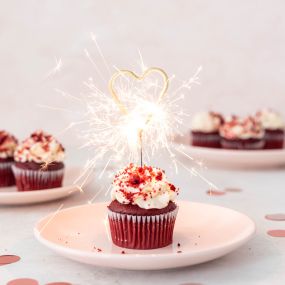 Classic and chic! Enjoy the smooth cream cheese frosting atop a moist red velvet cupcake, perfect for any occasion.