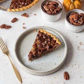 Sweet and nutty delight! Rich, caramel-like filling topped with whole pecans, this pie is a holiday favorite.