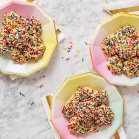 Colorful and buttery! These butter cookies covered in rainbow sprinkles are as fun to look at as they are to eat.