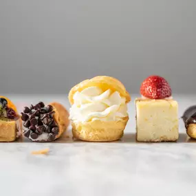 Tiny treats, big smiles! This elegant assortment of bite-sized pastries adds a touch of sweetness and sophistication to any celebration.