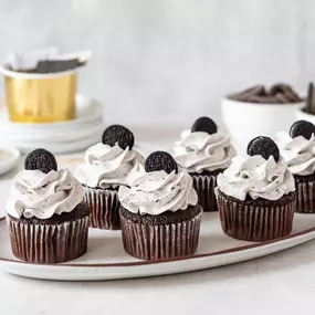 Cookies and cream dreams! These delicious cupcakes topped with a mini Oreo and cookie crumbs are perfect for indulging your sweet cravings.