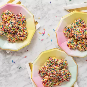 Colorful and buttery! These butter cookies covered in rainbow sprinkles are as fun to look at as they are to eat.