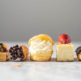 Tiny treats, big smiles! This elegant assortment of bite-sized pastries adds a touch of sweetness and sophistication to any celebration.