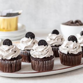 Cookies and cream dreams! These delicious cupcakes topped with a mini Oreo and cookie crumbs are perfect for indulging your sweet cravings.