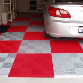 Make a statement with flooring that stands out! ????⚫ Bold tile designs bring color, style, and durability to your garage. Looking for a custom look? Let’s design something unique!