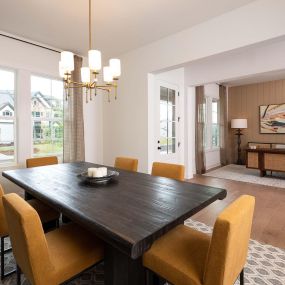 Model Home Dining Room with view to Formal Living Space at Garrison Parc