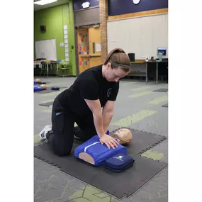Perfect body position!  Straight arms, straight back, hands in the center of the chest and wide base for awesome compressions