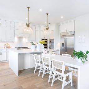 Quartz island with waterfall edge and a dining table extension