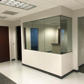 Precision Safety Films installed this reflective window film, offering an immaculate exterior appearance as a one-way mirror look maintaining privacy.  Experience seamless indoor visibility with our expert tinting services.
