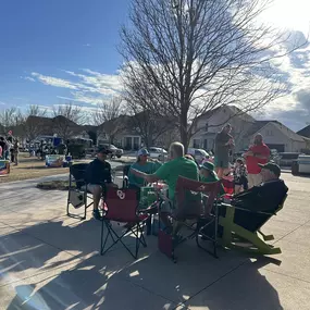 Let's Get Shamrocked! I hope you made it to the Front Porch for live music by Tyler Bond and airbrush tattoos sponsored by Rob Becker, State Farm.  There were giant games, food trucks: Flat Top Biscuits, Rokis and Texas Ice Cream. We passed out green beaded necklaces and helped with the photo op and enjoyed good conversation with our neighbors.