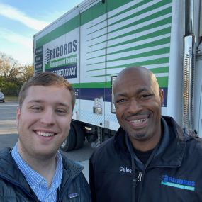 Two SRS mobile shredding technicians taking a selfie before setting off on their route