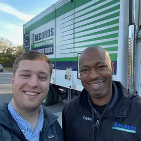 Two SRS mobile shredding technicians taking a selfie before setting off on their route