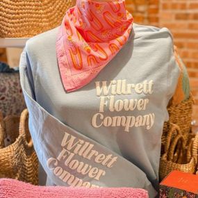 Glimpses of fall are starting to show in the shop! We have lots of new goodies! New apparel and cards just hit the shelves!