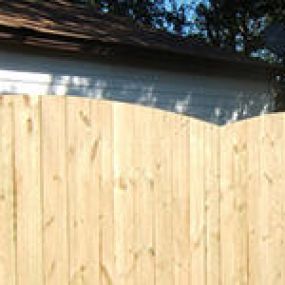 Quality Fence and Deck scallop arch fence