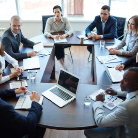 Roundtable full of business professionals hard at work