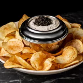 Indulge in our caramelized onion and caviar dip served with housemade chips, made exclusively for the Wagyu & Wine event. Join us now through November 1.