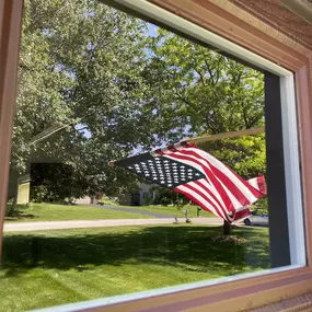 Beautiful clean glass reflection of the American Flag from 1-800 HydroHot