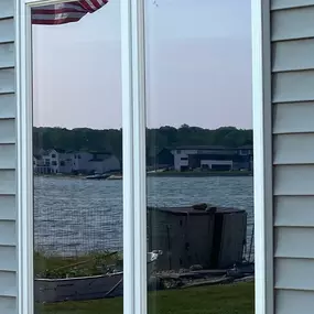 Beautiful lake view of clean glass from 1-800 HydroHot that allows this reflection