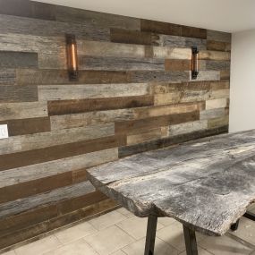 Our artisans are extremely adept at creating artful spaces, like this wood clad dining room remodel for a Sandy Springs homeowner