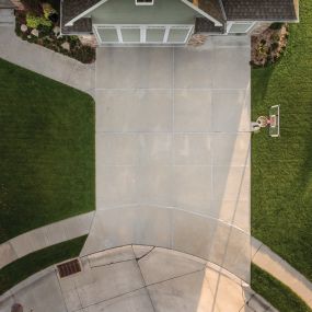If your concrete is cracked, sinking and uneven, Sterling Park Properties will pour a beautiful new concrete driveway for you and your family.