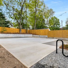 For Student Housing in midtown Atlanta is is vital to have safe parking for vehicles and bicycles. Here we have constructed a back yard concrcete parking area to accommodate five vehicles and installed a bicycle U-Shape for easy usage.