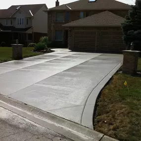 As a general contractor in Atlanta, we understand the importance of a well-crafted concrete driveway. It’s not just about enhancing your home's curb appeal; it’s about creating a durable, functional, and lasting addition to your property.