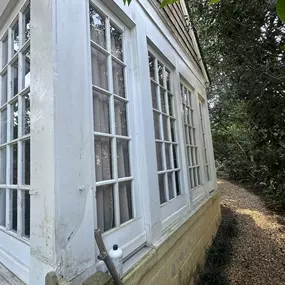 Exciting transformation underway! This existing structure will make way for a beautifully crafted new sunroom. We’ll demolish the old space and rebuild with new framing, drywall, and paint. Worn windows will be replaced with energy-efficient ones.