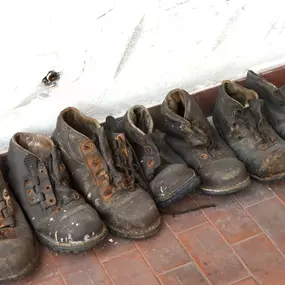 A photo of the Sterling Team's hardworking boots building your dram home into reality. We don't mind the hadrwork, because, like our boots, we are strong, resiliant and durable.