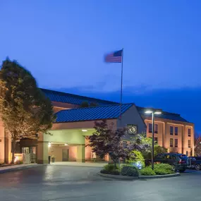 Larkspur Landing Carlisle exterior at night