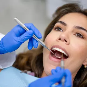 Dentist working with a patient