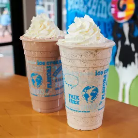 Two ice cream shakes in the Ben & Jerry's ice cream shop.