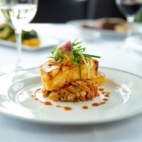 MISO-GLAZED SEABASS crab fried rice, chilled cucumber slaw