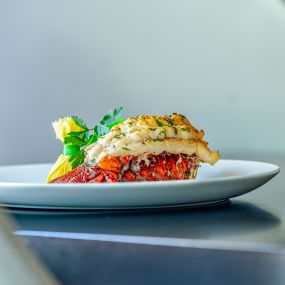 COLD-WATER LOBSTER TAIL butter finished & carved tableside