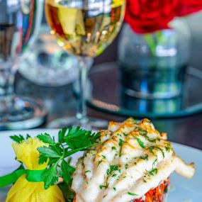 COLD-WATER LOBSTER TAIL butter finished & carved tableside