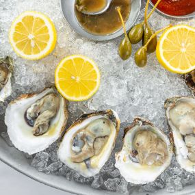 FRESH OYSTERS ON THE HALF SHELL* half dozen, horseradish, cocktail sauce, champagne
mignonette