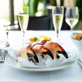 FRESH STONE CRAB CLAWS Served fresh and never frozen, these sweet, meaty claws are pulled from the traps and arrive at your table chilled, pre-cracked, and with our house specialty mustard sauce. All in less than 24 hours.