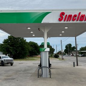 Sinclair gas station fueling island