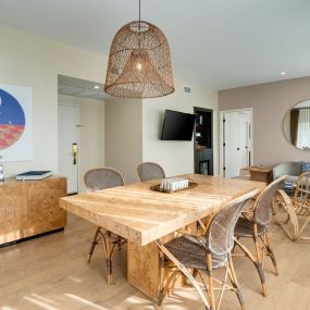 dining and living area on a suite at savoy hotel miami beach