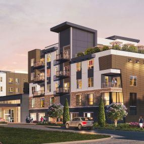 Exterior of The Gallery at Fort Collins senior living community at sunset