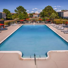 Newly renovated pool with ample seating on large sundeck.