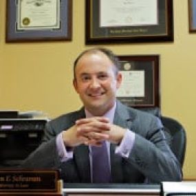 Sole Practitioner Adam E. Schramm