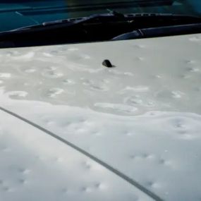 Boost your vehicle’s efficiency and aesthetic appeal by taking care of hood dents.