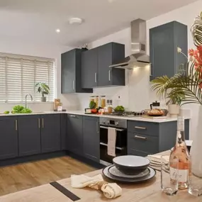 The Filey show home kitchen/dining area at Waterman's Gate