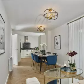 Typical kitchen / dining / family room interior of The Winkfield at another Crest development