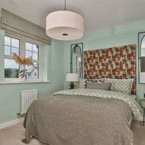 Photography of the bedroom interior of the Sevington Lakes Redgrave Show Home