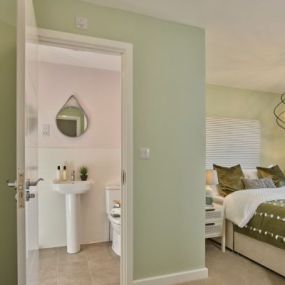 Photography of the bedroom / ensuite interior of the Sevington Lakes Redgrave Show Home