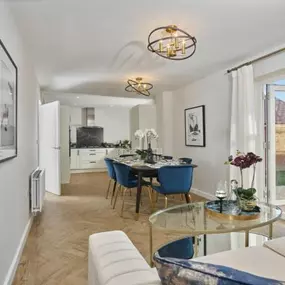 Photography of the kitchen / dining / family room interior of the The Winkfield house type from another Crest development